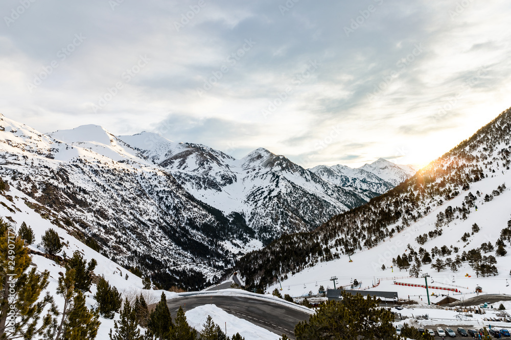 Sunrise in high mountain snowy landscape