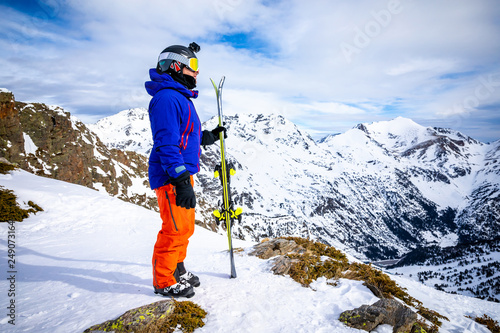 Portrait of a skier in high mountain