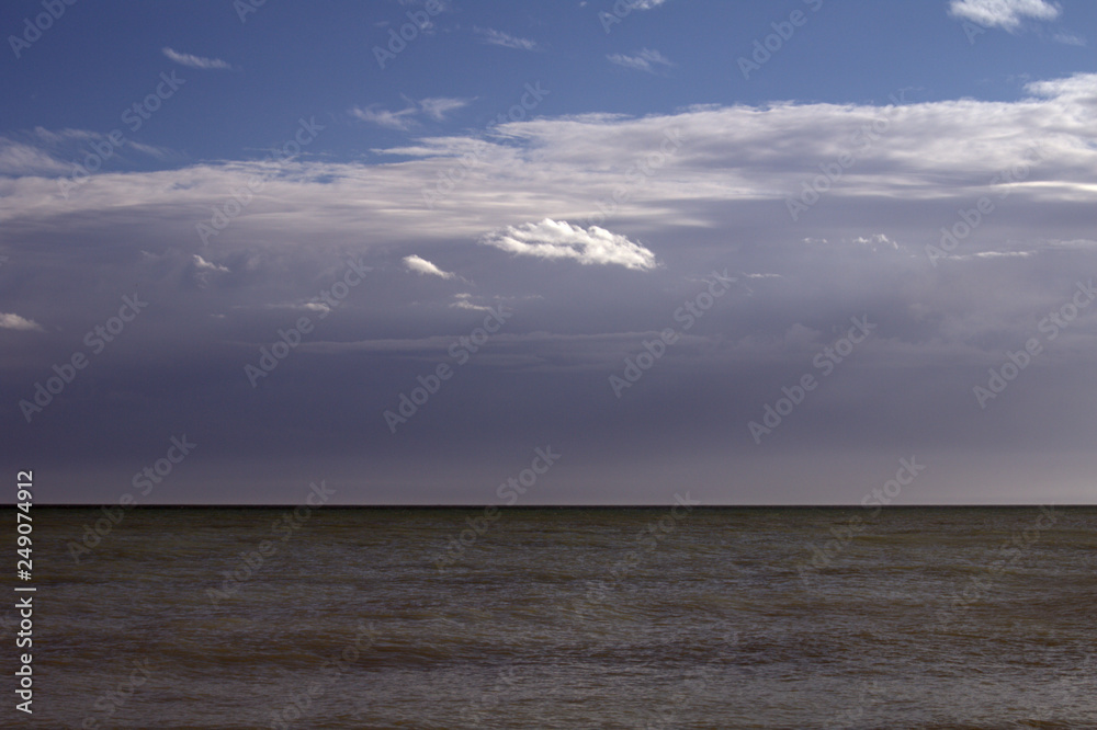 clouds over the sea,horizon,view,seascape,water,nature,panorama