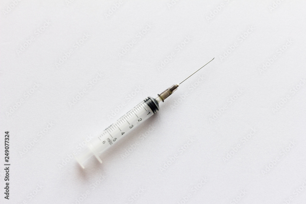 new disposable injection syringe on white background new disposable injection syringe on white background