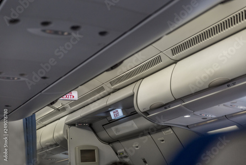 EXIT signaling inside a commercial aircraft