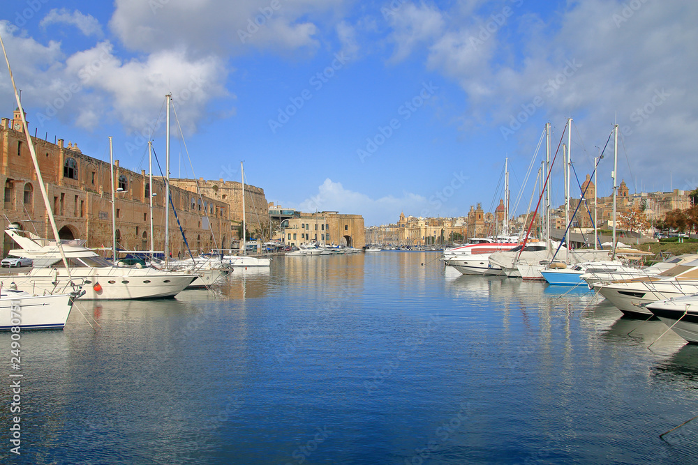 Malta island harbor with moored yachts.