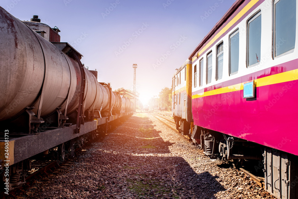 Obraz premium Railroad track, Railway tracks parked wagons at the station waiting for unloading.