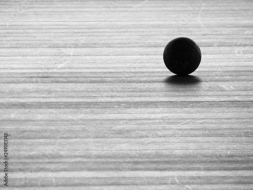 black and white silhouette basketball on the floor