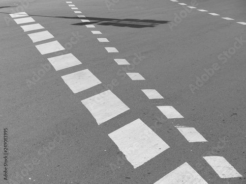 shadow of Traffic light pole on road