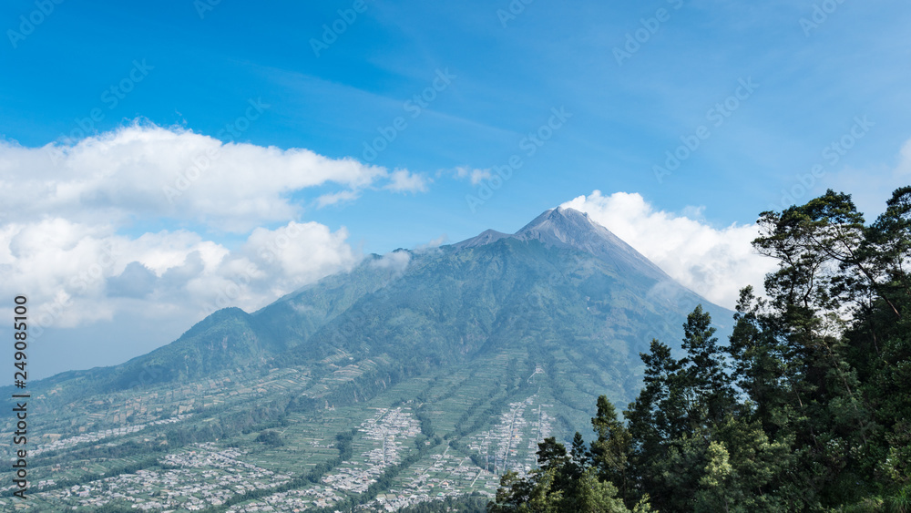 The very active peak of Mount Merapi volcano in Java Indonesia.