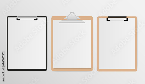 Set of clipboard with white sheet on gray background photo