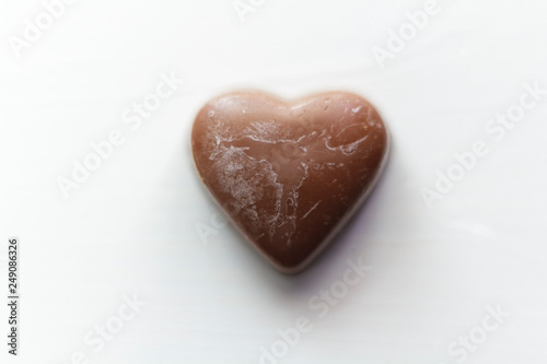 Chocolate heart on white background