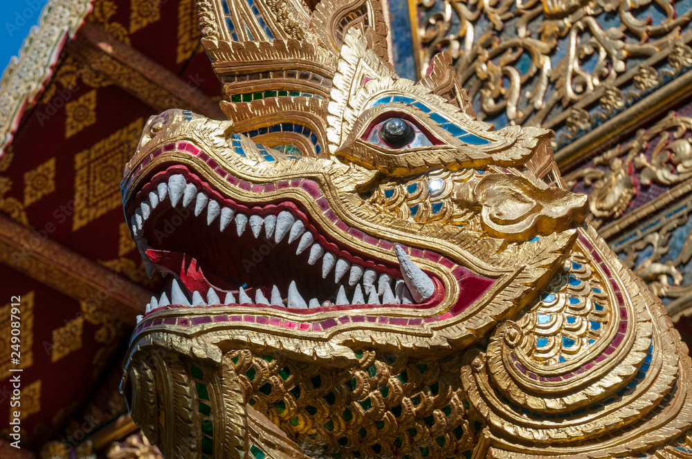 Naga decoration on baluster, Wat Phra Singh, Chiang Mai, Thailand. Naga decoration on baluster, Wat Phra Singh, Chiang Mai, Thailand.