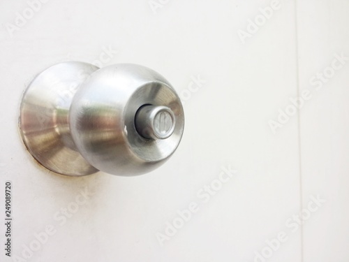 door knob with wooden door background