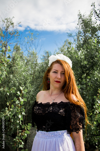 Portrait of Young beautiful redhead woman 