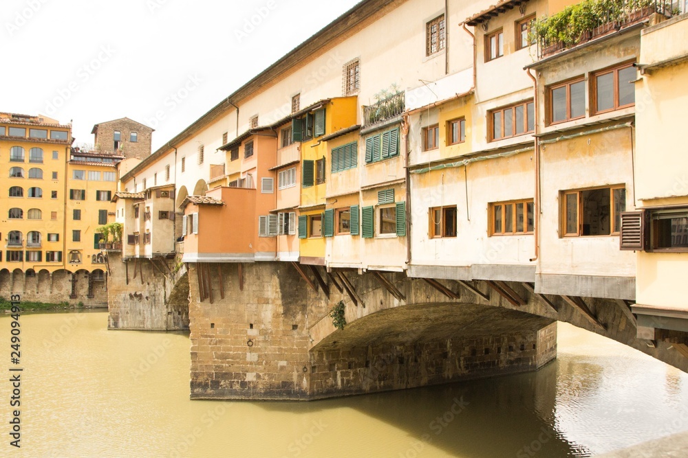 Fragment of Ponte Vecchio bridge over Arno river in Florence. Close up photo. Architecture and landmarks of Florence, Italy.