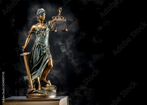 Fotografie Photography of bronze themis sculpture, femida or justice goddess on dark backgr