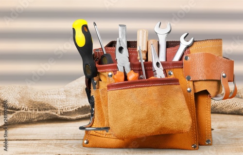 Wallpaper Mural Tool belt with tools on light background Torontodigital.ca