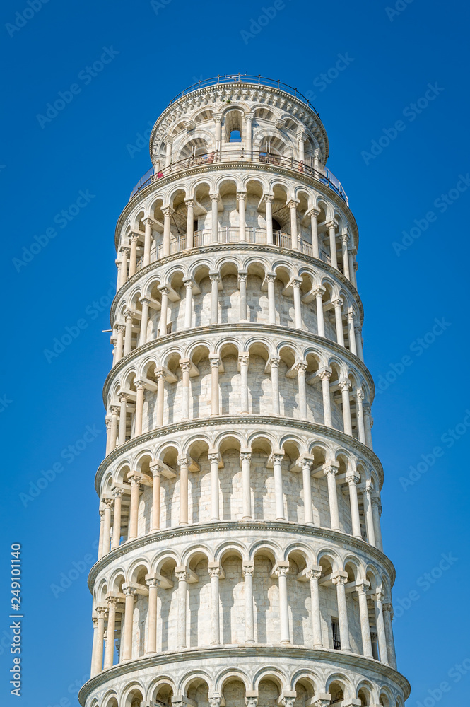 Pisa Tower close up vertical photo wit blue sky background. Toscana, Italy