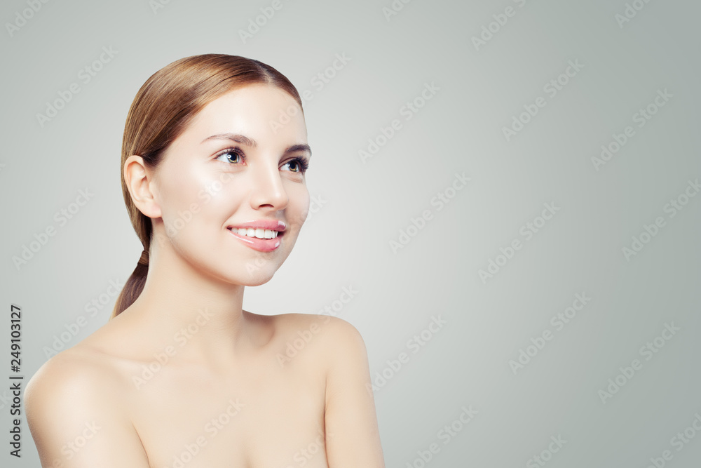 Pretty girl face. Beautiful woman with healthy skin. Facial treatment, skincare and cosmetology concept. Pretty girl face. Beautiful woman with healthy skin. Facial treatment, skincare and cosmetology concept.