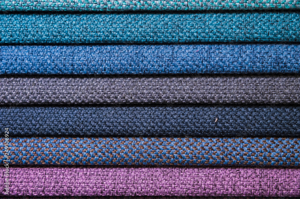 Abstract volumetric background textile multicolored stripes of furniture upholstery patterns. Home comfort concept Abstract volumetric background textile multicolored stripes of furniture upholstery patterns. Home comfort concept