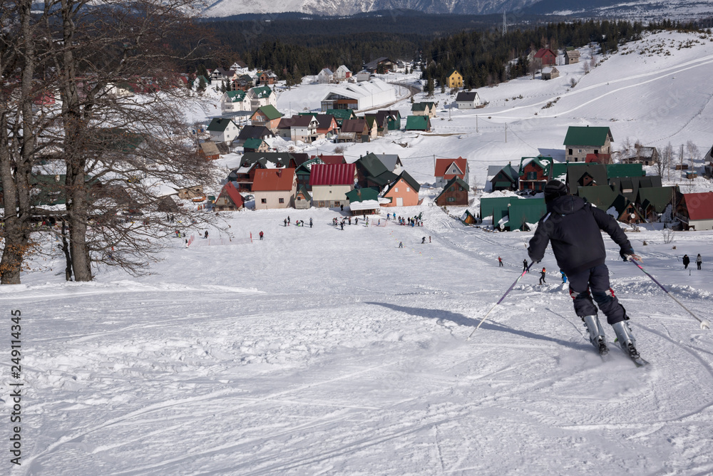 Man downhill skiing on ski Resort in winter sunny day, 2019-02-10, javoravoca
