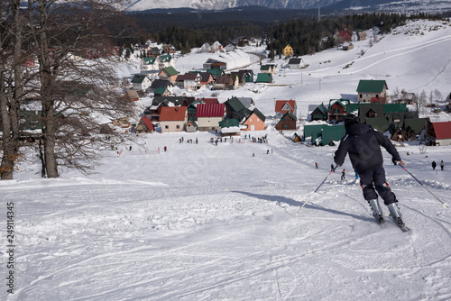 Man downhill skiing on ski Resort in winter sunny day, 2019-02-10, javoravoca