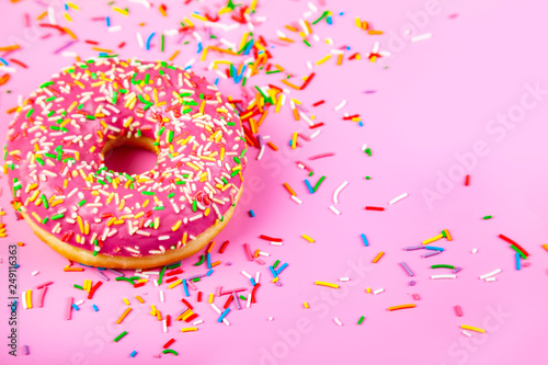 Donut on a pink background.