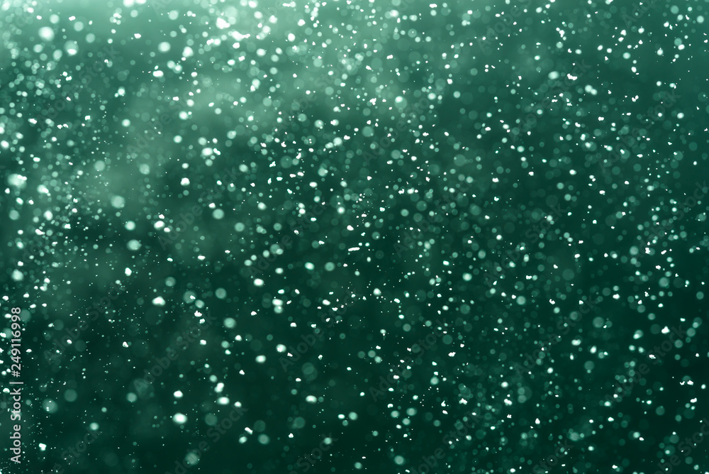 Abstract Green bokeh defocus glitter blur Background.