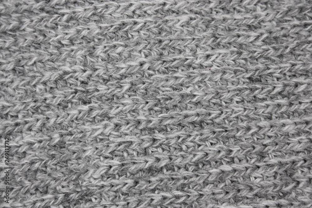 texture of a gray knitted  woolen cloth