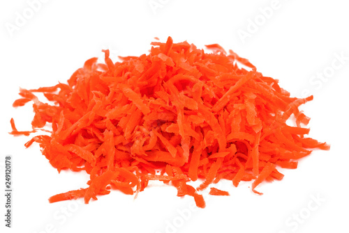 Grated carrots isolated on white background