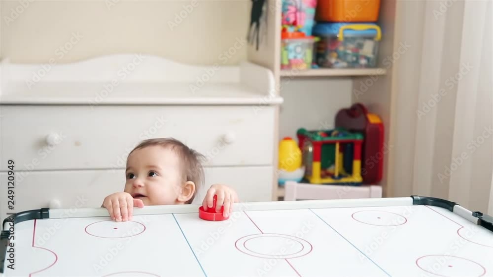Little girl wants to learn how to play air hockey Little girl wants to learn how to play air hockey