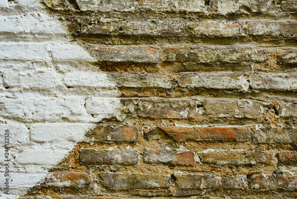 Fototapeta premium Brick wall with big white arrow indicating direction, background with copy space.