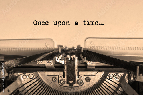 once upon a time...  printed on a sheet of paper on a vintage typewriter. writer, journalist.