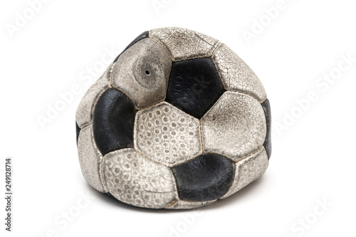 Old football ball isolated on white