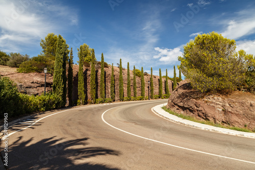 Fototapeta Naklejka Na Ścianę i Meble -  Empty road in the mountains, southern France. Copy space. Holidays in France.