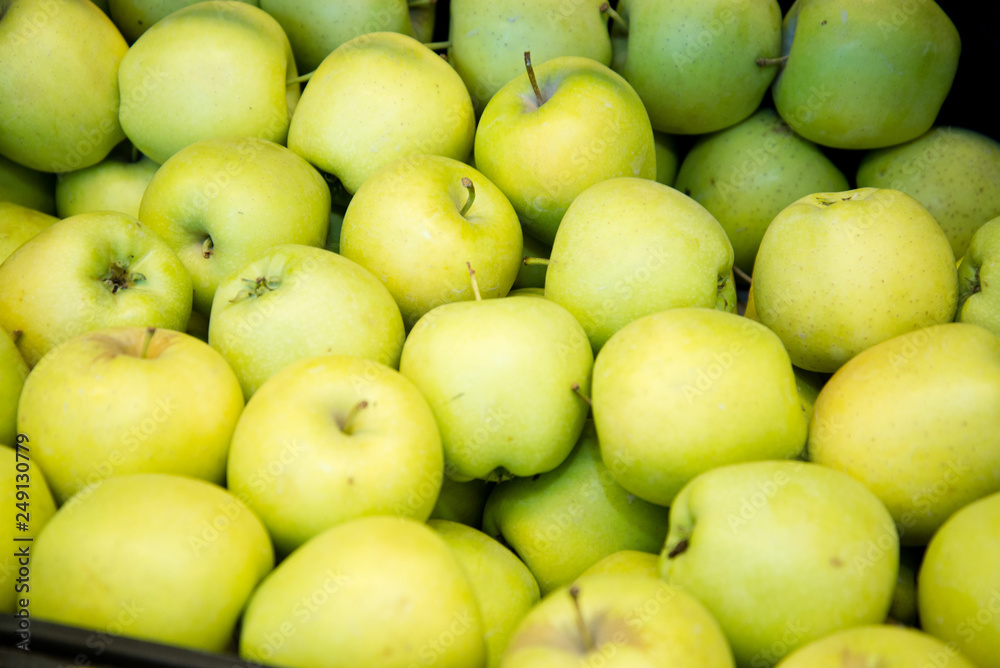 ripe apples on the counter in the supermarket ripe apples on the counter in the supermarket