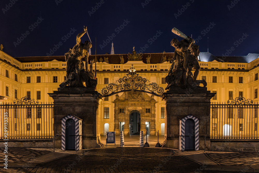 Main Gate of Prague Castle with Statue of Battling Titans, Hradcanske Square at night, Prague, Czech Republic