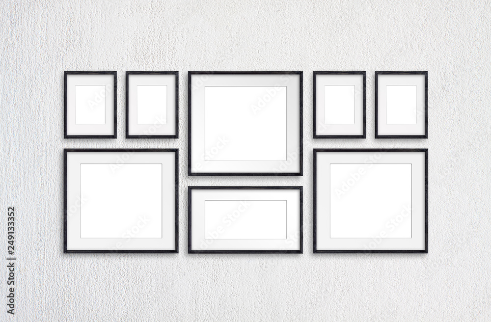 Black wooden realistic photo frames, eight frameworks collage on white plastered wall Black wooden realistic photo frames, eight frameworks collage on white plastered wall