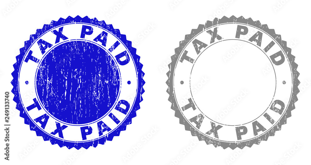 Grunge TAX PAID stamp seals isolated on a white background. Rosette seals with grunge texture in blue and gray colors. Vector rubber stamp imitation of TAX PAID label inside round rosette. Grunge TAX PAID stamp seals isolated on a white background. Rosette seals with grunge texture in blue and gray colors. Vector rubber stamp imitation of TAX PAID label inside round rosette.
