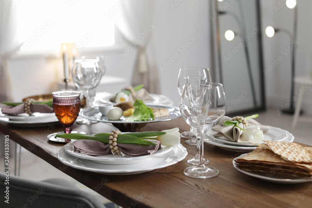 Fototapeta premium Festive Passover table setting at home. Pesach celebration