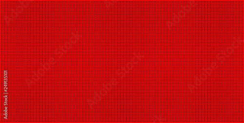Abstract minimal texture. Halftones of black dots on red background. Perforated backdrop.