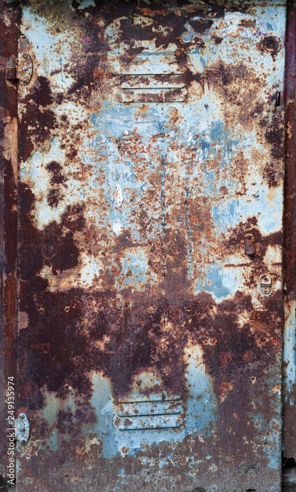 Fototapeta premium Background from old burnt rusty iron with peeling paint