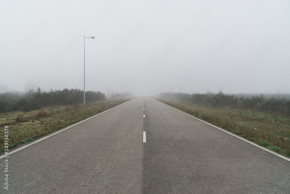 Foggy open road
