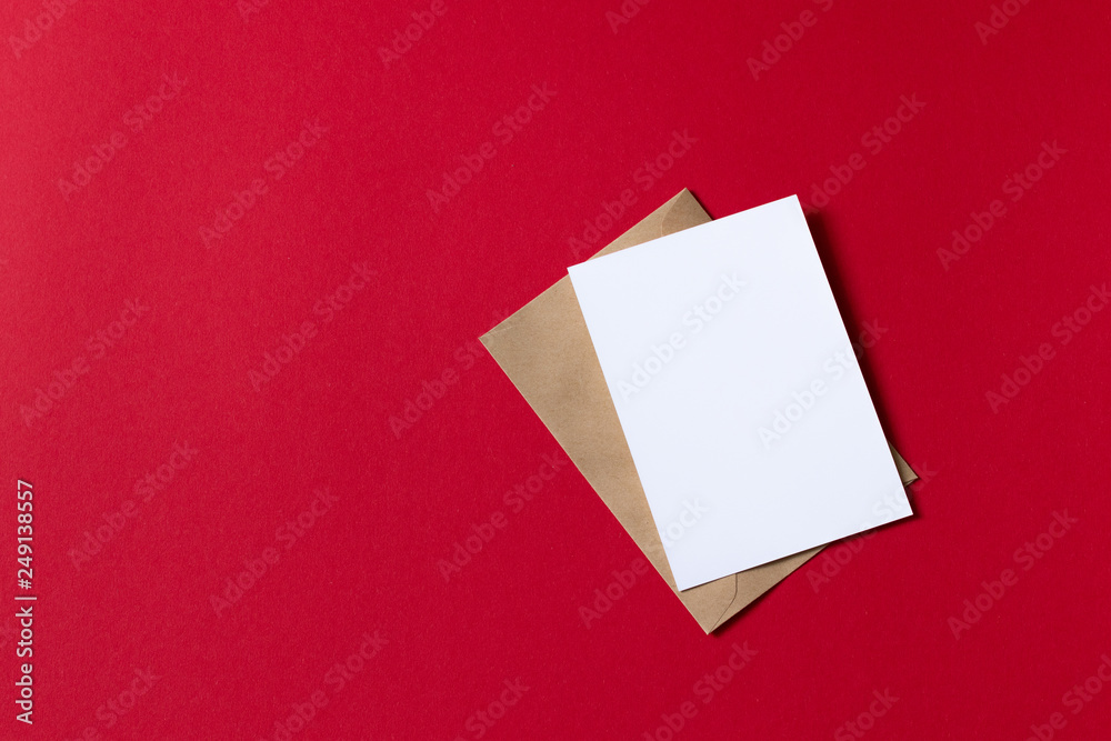 Blank white card with kraft brown paper envelope template mock up Blank white card with kraft brown paper envelope template mock up