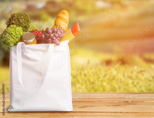 Full shopping bag, isolated over background