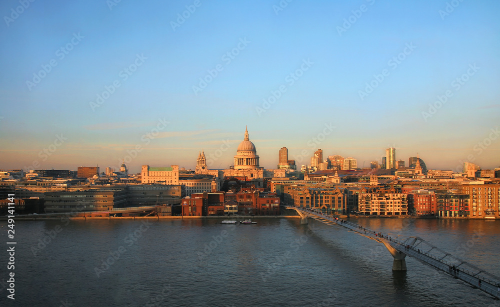 Sunset view of St Paul's Cathedral and Millennium Bridge