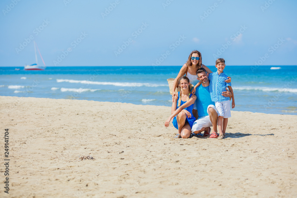 Happy family having fun at beach together. Fun happy lifestyle in the summer leisure