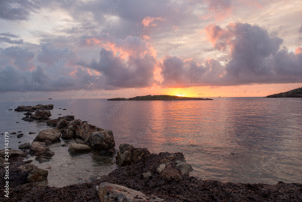 Obraz premium The cala sa sal rossa in ibiza at dawn