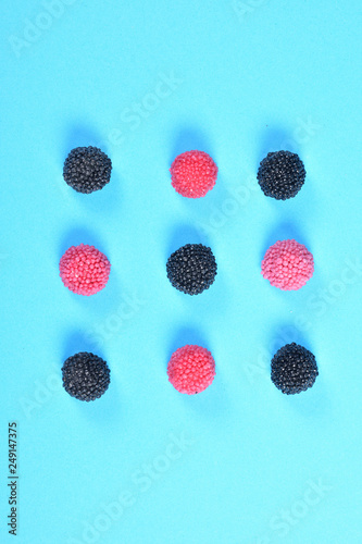 group of Blackberry  jelly candy on blue background