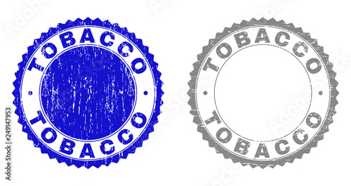 Grunge TOBACCO stamp seals isolated on a white background. Rosette seals with grunge texture in blue and gray colors. Vector rubber stamp imitation of TOBACCO caption inside round rosette.