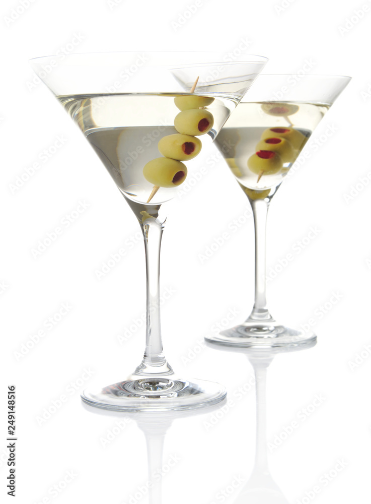 Two classic dry martini with olives isolated on white background