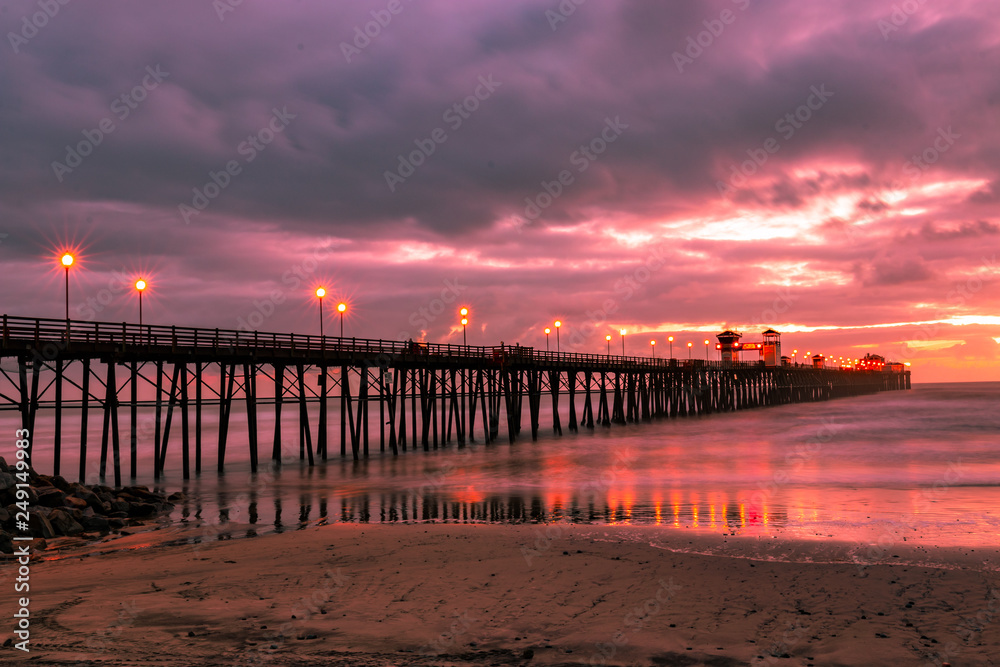 Pier at sunset on a rainy day