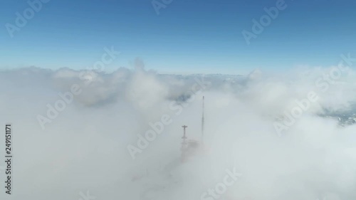 Stunning mountain winter landscape of Stirovnik peak with telecommunication tower, the highest summit of the Lovcen National Park. photo